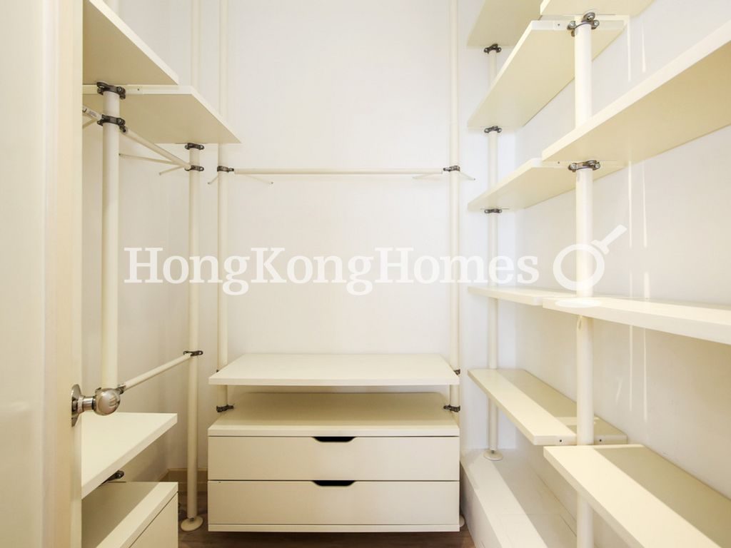 Walk-in Closet in Master Bedroom — La Hacienda - Apartment A, The Peak